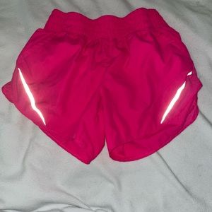 Pink running shorts